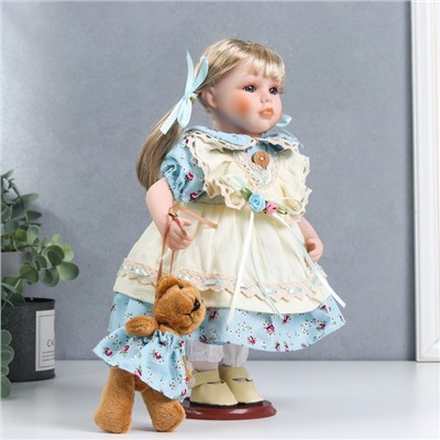 Кукла коллекционная керамика "Света в бежево-голубом платье с цветами, с мишкой" 30 см