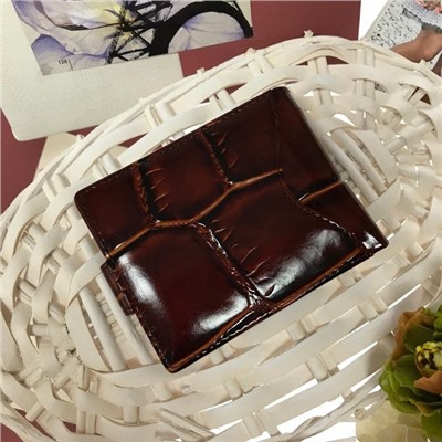 Мужской кошелек Makassar из натуральной матовой кожи цвета горького шоколада.
