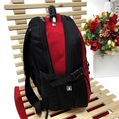 Высококачественный функциональный рюкзак Carino из износостойкой ткани чёрного цвета с гранатовыми вставками.