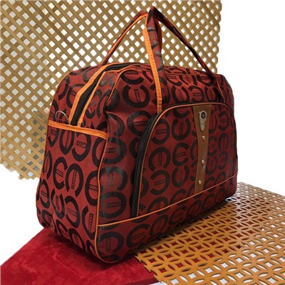 Дорожная сумка Blezer красного цвета с рисунком абстракцией.