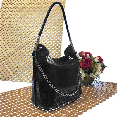 Стильная женская сумочка Viven из натуральной замши с лазерной обработкой чёрного цвета.