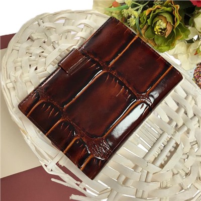 Мужской кошелёк-портмоне Makassar из натуральной кожи цвета горького шоколада.